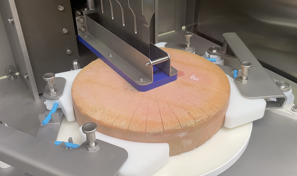 ULTRASONIC SLICER FOR ROUND PRODUCTS